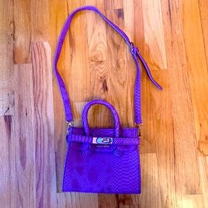 Cute purple bag for any occasion.